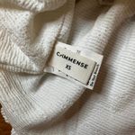 COMMENSE White Textured V Neck Sleeveless Peplum Top Black Bow Accent Size XS Photo 5