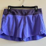 Nike  DRI-FIT Revival Stretch Running‎ Shorts 4" Womens Size M Purple Athletic Photo 0