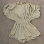 Yellow Romper with open back Size XS Photo 0