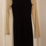 Auditions Black and nude knee length mini dress size small Photo 1