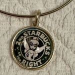 ALEX AND ANI Bracelet - Starbucks - Tinkerbell - bangle, adjustable, charms, silver tone. 2nd Starbucks on the right (Peter Pan movie reference) gently used - no flaws. Smoke free home. Photo 2