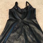 Urban Outfitters Faux leather zip down black dress never worn Photo 2