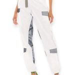 I am gia I.AM.GIA | Small | Halo Pant White Silver Reflective Cargo Parachute Jogger Photo 0