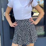 Brandy Melville Navy blue floral mini skirt Photo 0