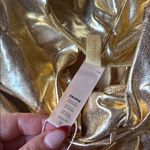 SKIMS  Gold Metallic Mini Skirt Photo 1