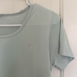 Under Armour EUC women’s pale minty blue stretch athletic heat gear top medium Photo 1