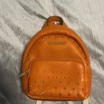 Michael Kors  mini orange backpack  Photo 1