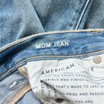 American Eagle  Medium Wash Mom Jeans Raw Hem Size 0 Photo 4