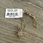 ViVI Gold Starburst Necklace with Crystal Accents Photo 2