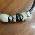 Vintage stone, metal and rhinestone beaded charms on black leather necklace Photo 6