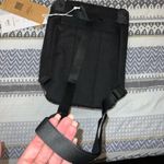 Herschel Supply Company Herschel Retreat Sling bag NWT
Black winter plaid Photo 4