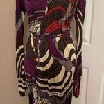 Rochelle Rodriguez Clothing vintage long sleeve wide cuff multicolor wrap dress. Photo 0
