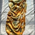 Pretty Little Thing β
NWT Ruched Side Midi skirt - Orange Tie Dye β
Photo 9