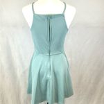 Trixxi light aqua blue peek a boo lace fit and flare dress size small. Photo 3