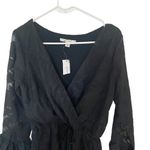 Miami  NEW black bell bottom sleeves lace faux wrap medium romper Photo 1