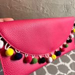 Pink Pebbled Clutch with Playful Tassel Pom Pom Trim Photo 2