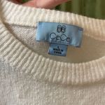 CeCe White Ruffle Sweater Photo 1