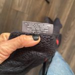 Wooden Ships  Charcoal blue Knit sweater with orange colored letters reading Love Photo 4