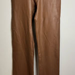 SKIMS  tan faux leather pants with a high waist and straight leg fit Photo 0