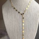 Gold Drop Star Necklace Photo 0