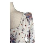 Rewind -CREAM COLOR FLORAL SMOCKED TOP-WOMENS SIZE SMALL Gorgeous top, fro t and back smocking, women’s size small, excellent condition  Measurements: Bust: armpit to armpit 14-18 inches  Length: shoulder seam to bottom 17 inches Photo 3