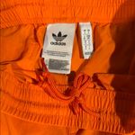 Adidas NWOT  Women's Sprinter Shorts. Size S. Back pocket. Elastic band Photo 6
