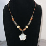 White seashell carved flower necklace on beaded leather cord 15” 3” ext Brown Photo 0