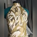 “Chic halter neck dress with a stunning abstract pattern in earthy tones. Tan Size 4 Photo 1