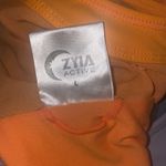 Zyia  Active Women’sTurmeric Clasp Mesh Key Hole Sports Bra Size Large Photo 3