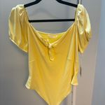 LC Lauren Conrad  Yellow Puff Sleeve Tie Front Bodysuit Photo 0