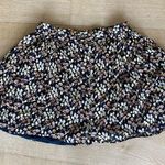 Urban Outfitters  Mini Skirt with Daisy Print in Black Photo 0
