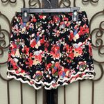 Charlotte Russe  floral pull on shorts with fringe hem Photo 1