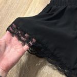 Lush Clothing Lush size small super comfy elastic waist band shorts with lace on the bottom Photo 1