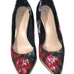 BCBGeneration Bcbg black heels with black and rose flower design overlay. Photo 5