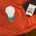 Ava & Viv Orange elastic wrap skirt Photo 1