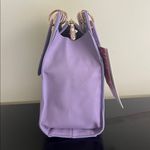 Trina Turk double handle tote in lilac with a removable crossbody strap Photo 7
