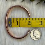 Magnetic copper tone cuff bracelet Photo 3