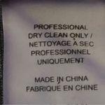 Alice + Olivia “Dahlia” metallic, square neckline, peplum dress in size 2. EUC Photo 9