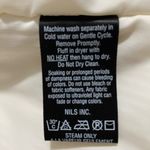 Stylish NILS insulated white ski jacket with custom metal accents Size 10P Photo 5