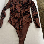 A New Day  Long Sleeve Bodysuit Photo 0