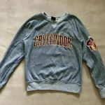 Harry Potter Authentic Universal Studios  Gryffindor House sweatshirt Crewneck Photo 1