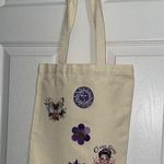 Handcrafted Stylish off white Tote Bag with Fun Patches Purple Photo 0