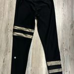 Gottex G By  Size XS Black Leggings with gold inseam is 25 Photo 1