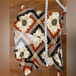 Eye Candy  Geometric Wrap Blouse in Black, Brown, and Gold Photo 2