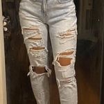 American Eagle stretch light wash ripped mom jeans Photo 0