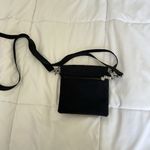 Baggallini Black Water-Resistant Nylon Lightweight Pocket Town Crossbody Bag Photo 8