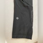 Lululemon  Logo Waistband High Rise Training Crop Graphite Grey Size 2  Pockets Photo 8