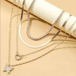 ✨ 5 piece gold tone necklaces Photo 1