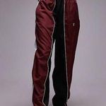 Topshop  sporty shell cuffed tracksuit bottoms in burgundy Photo 1