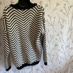 Cyrus  Black and White Chevron Sweater Photo 1